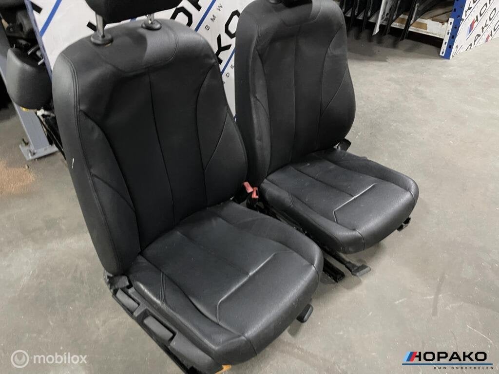 Voorstoelen zwart leder BMW F20 1 serie ETC, Gebruikt, Einsteinlaan 5 rijswijk, Bmw, Ophalen of Verzenden