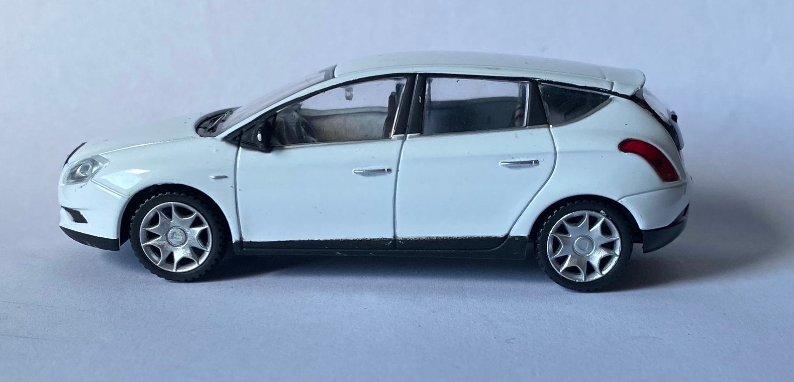 Lancia Delta 1:43, Ophalen of Verzenden, Zo goed als nieuw, Auto, Overige merken