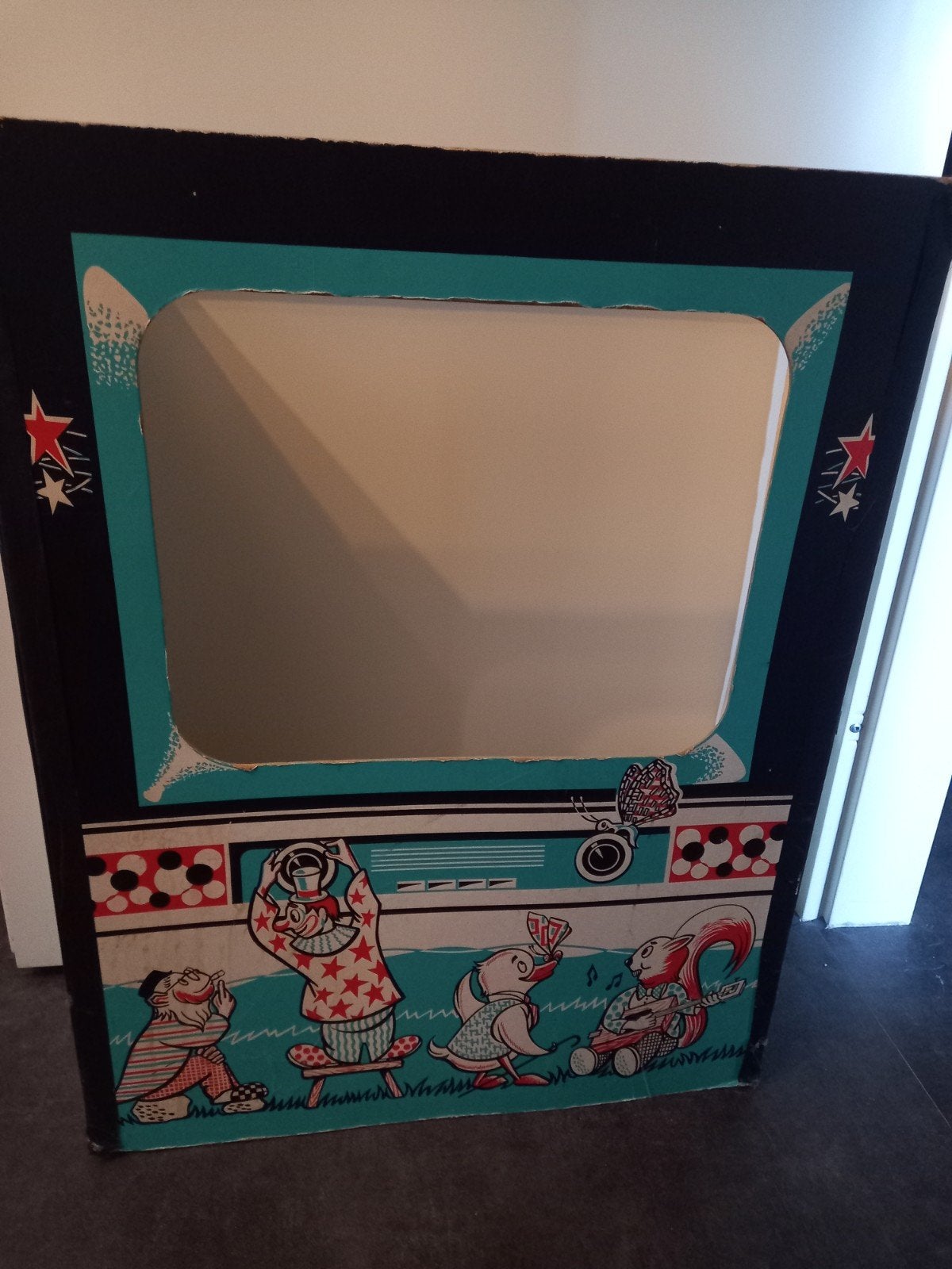 Vintage kartonnen speelgoed poppenkast met dierenprint, Ophalen
