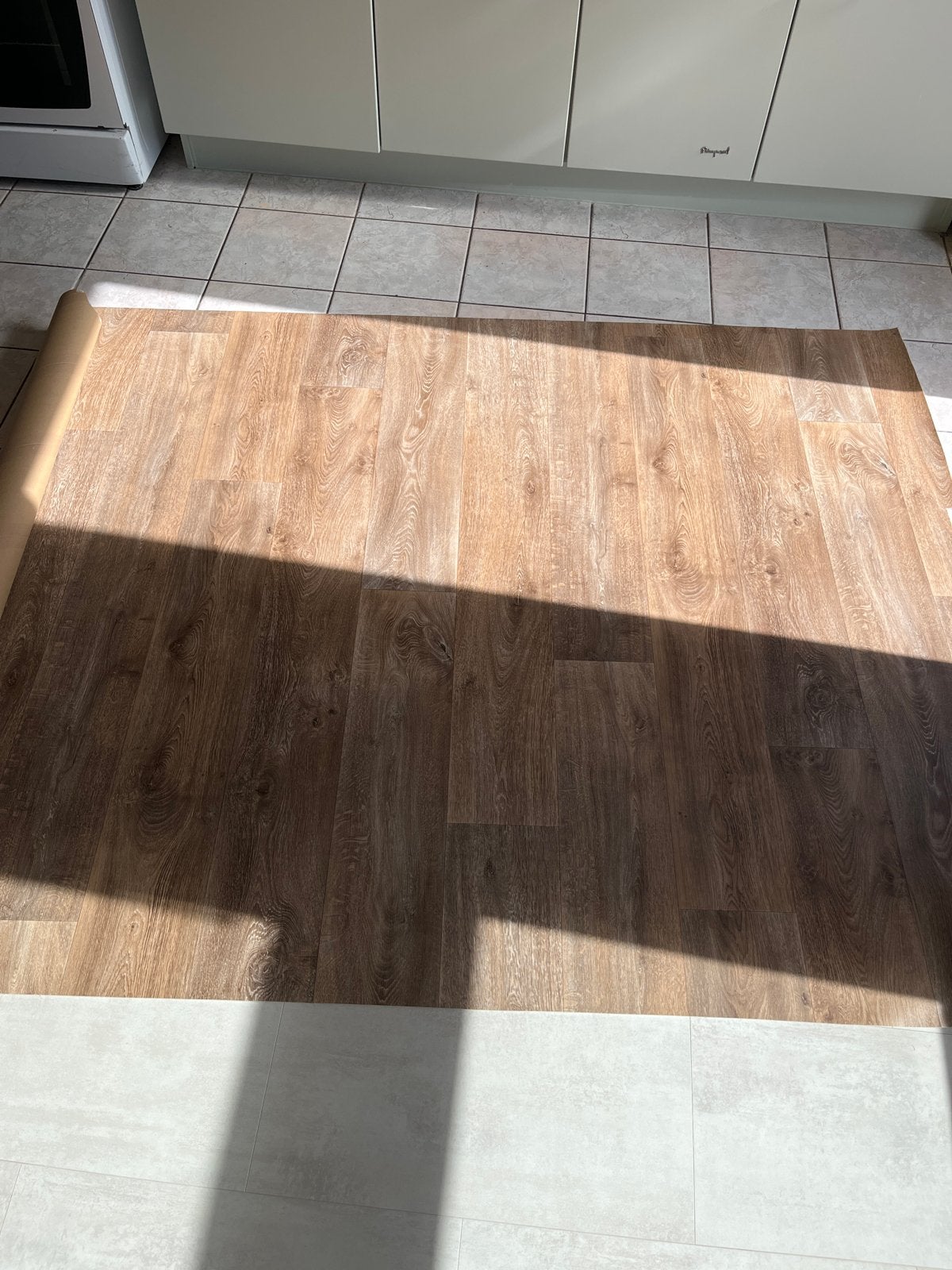Vinyl vloerbedekking met houtnerf - nieuw 1,7 X 2 meter, Huis en Inrichting, Ophalen, Bruin, Zo goed als nieuw, Minder dan 5 m²