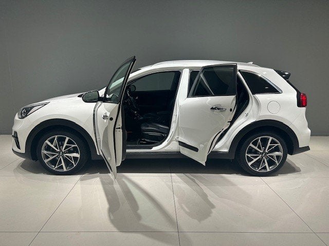 KIA Niro 1.6 GDi Hybrid 141pk DCT6 DynamicPlusLine, Auto's, Gebruikt, Leder en Stof, Wit, Origineel Nederlands