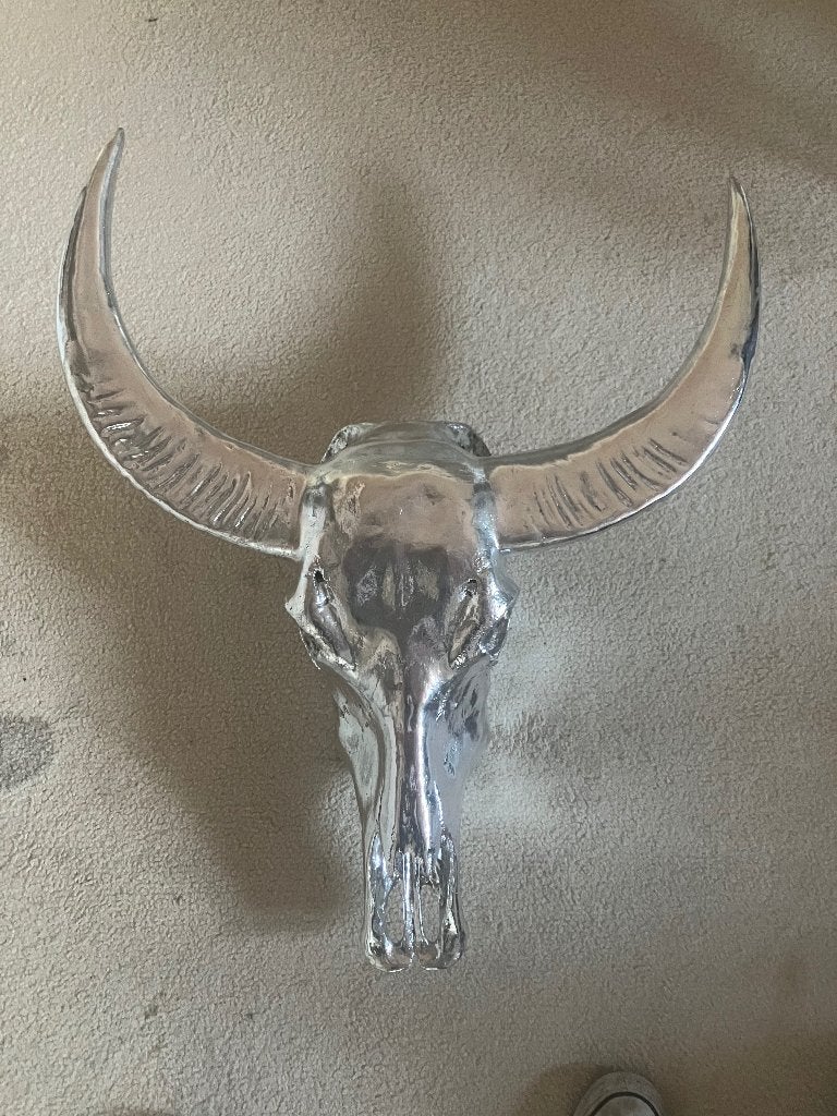 Verchroomde ossen skull, Ophalen
