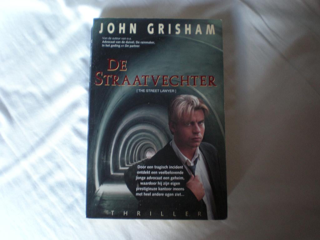 Boek. Thriller. De straatvechter. John Grisham., Ophalen of Verzenden, Gelezen, John Grisham