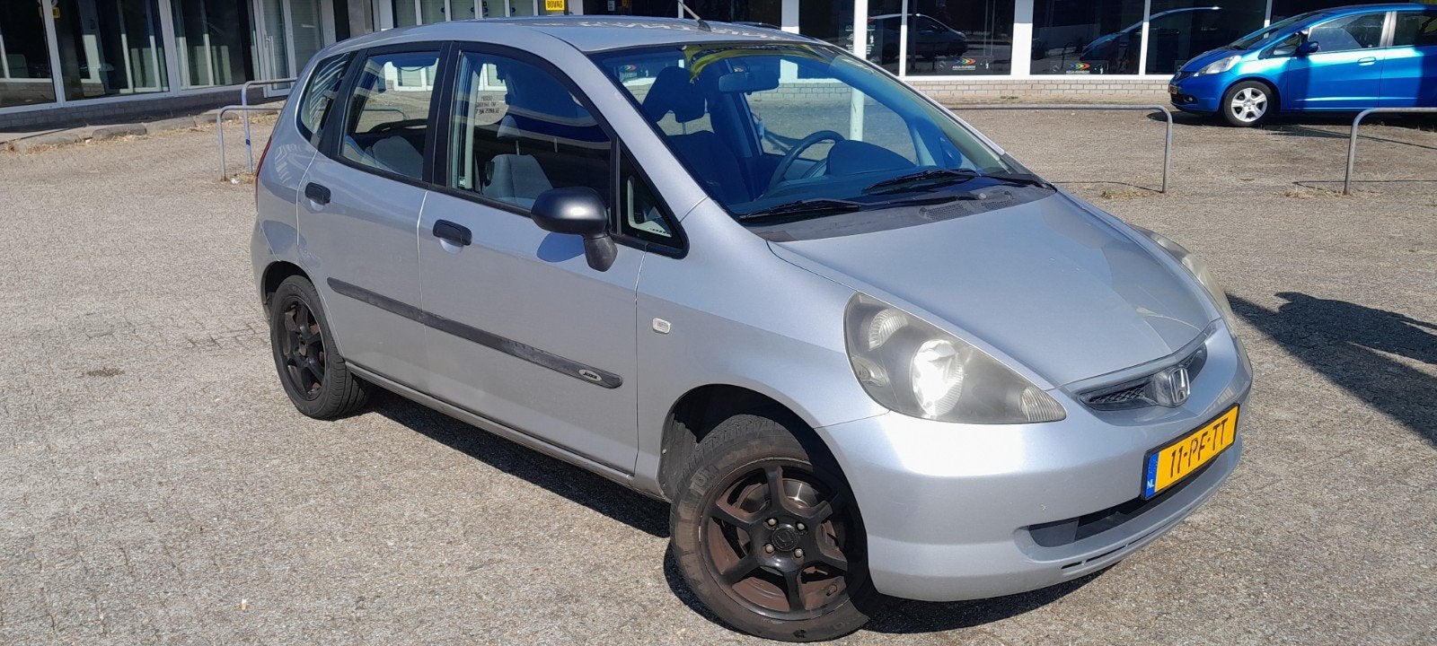 Honda Jazz 1.2 I S 2004 Grijs, Auto's, Honda, Voorwielaandrijving, 450 kg, 40 €/maand, 4 cilinders