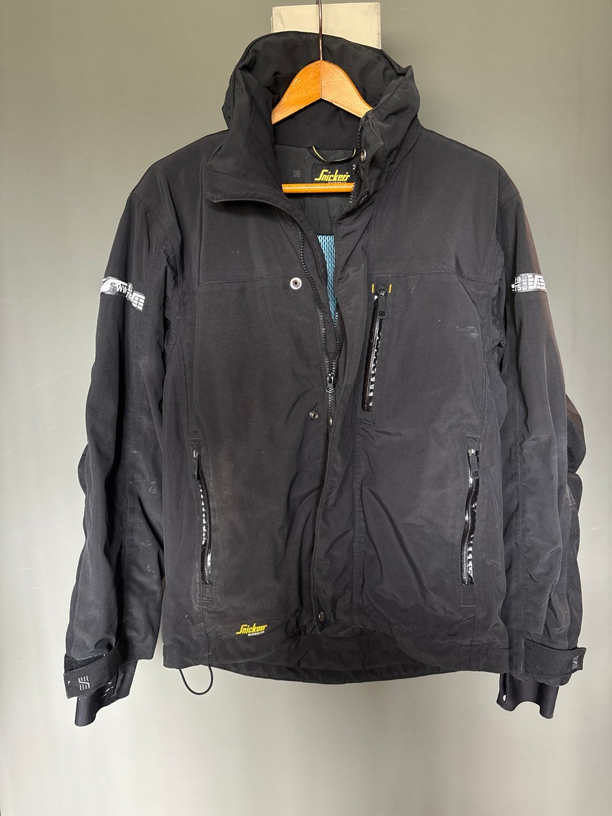 Snickers Workwear Jas Zwart Maat L, Ophalen of Verzenden, Gedragen, Maat 48/50 (M), Zwart