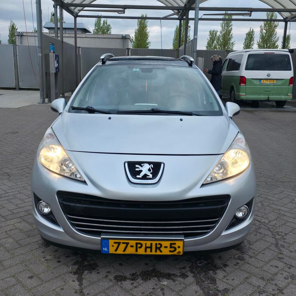 Peugeot 207 1.6 16V SW Outdoor 2011 Grijs, Auto's, Voorwielaandrijving, 4 cilinders, Origineel Nederlands, Stationwagon
