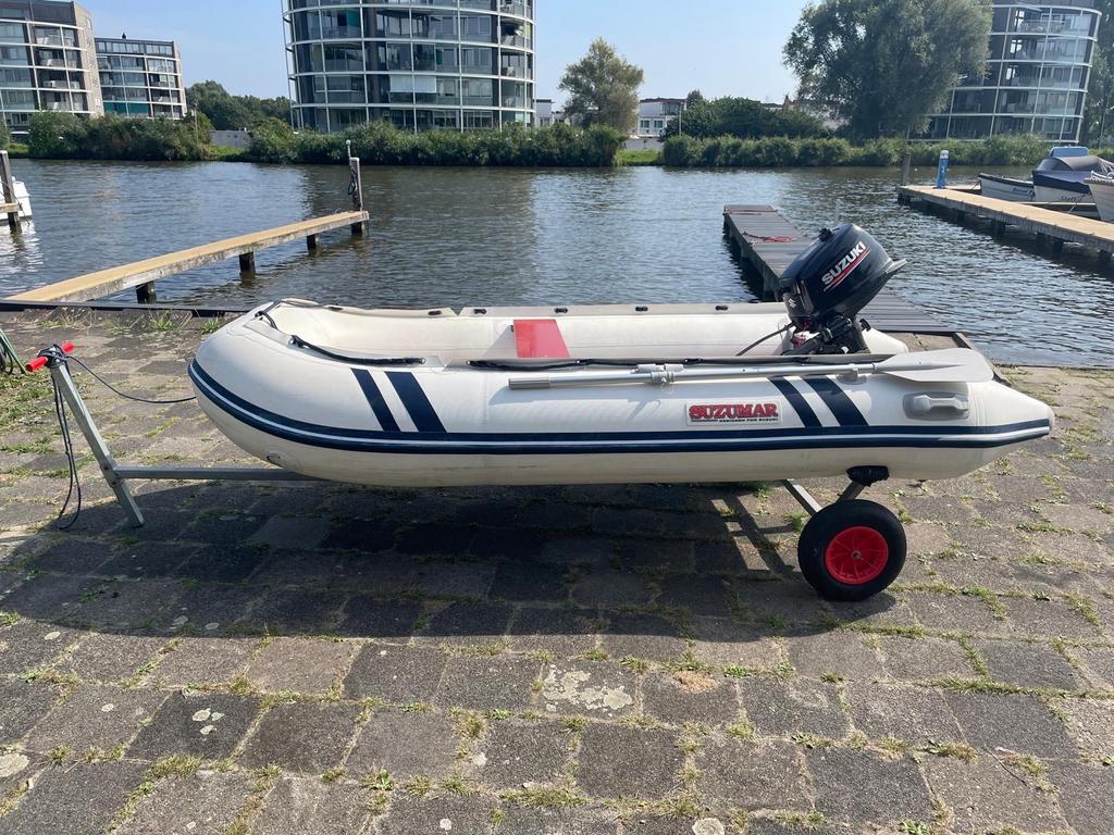 Suzumar rubberboot met motor 6pk, trailer, alle toebehoren, Watersport en Boten, Rubberboten, Zo goed als nieuw, Benzine, Minder dan 70 pk