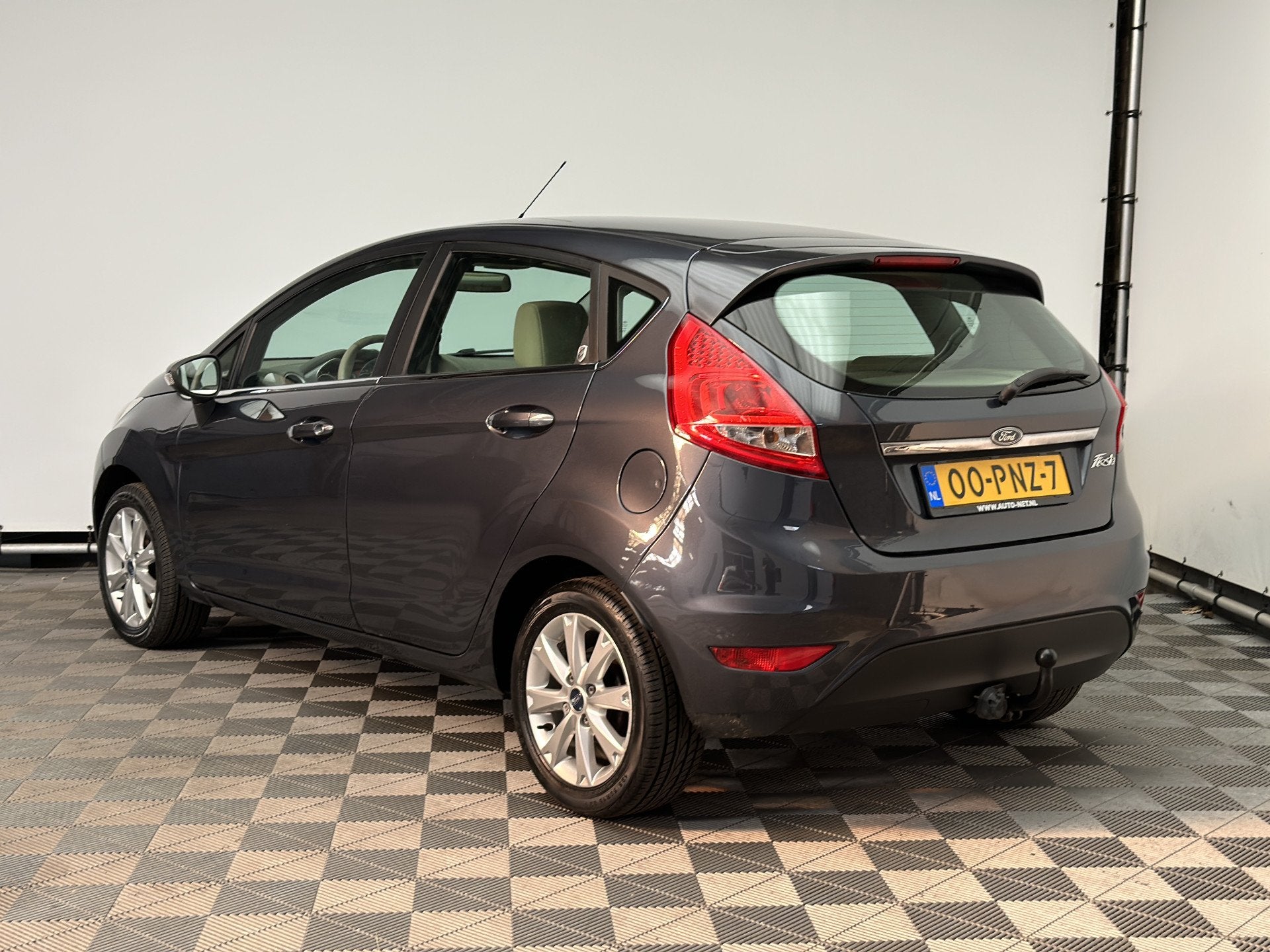 Ford Fiesta 1.25 Ghia 5-drs ECC LM15" NL Auto (bj 2011), Voorwielaandrijving, Euro 5, Stof, Met garantie (alle)