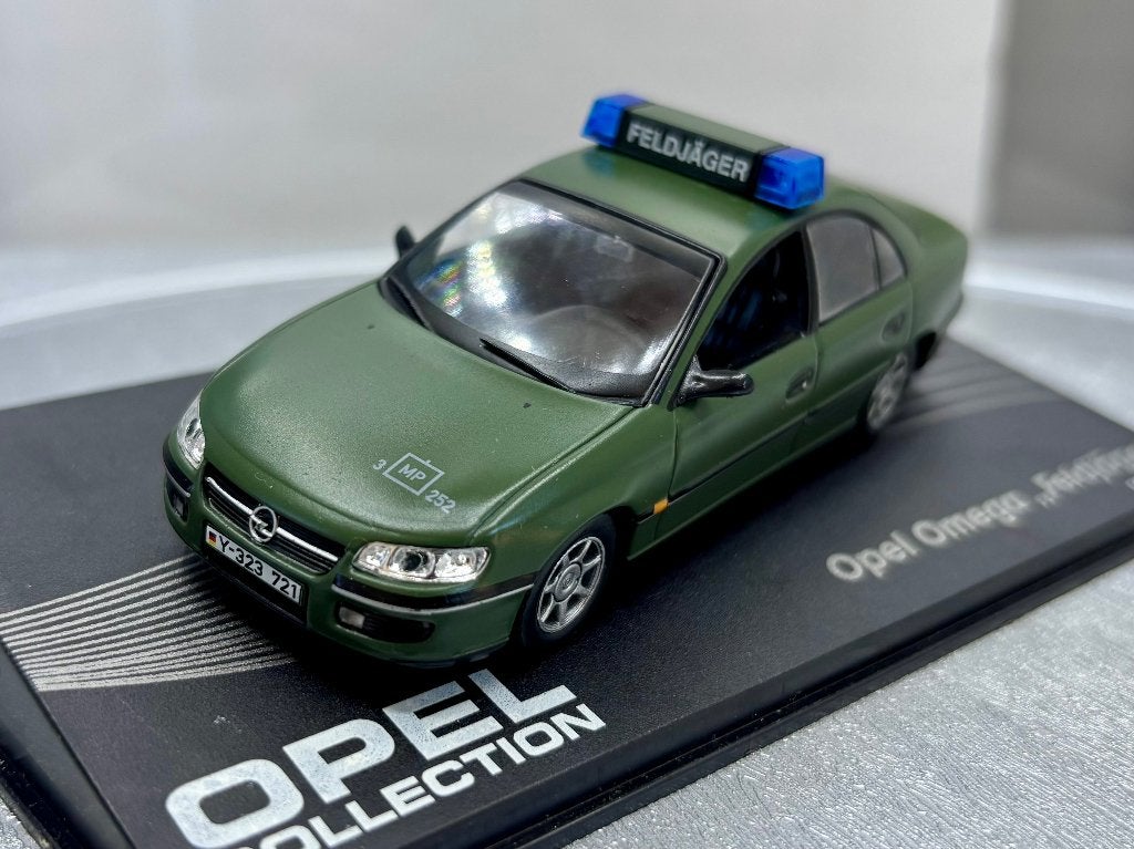 1:43 Opel omega feldjager 1994-1998., Ophalen of Verzenden, Zo goed als nieuw, Auto, Overige merken