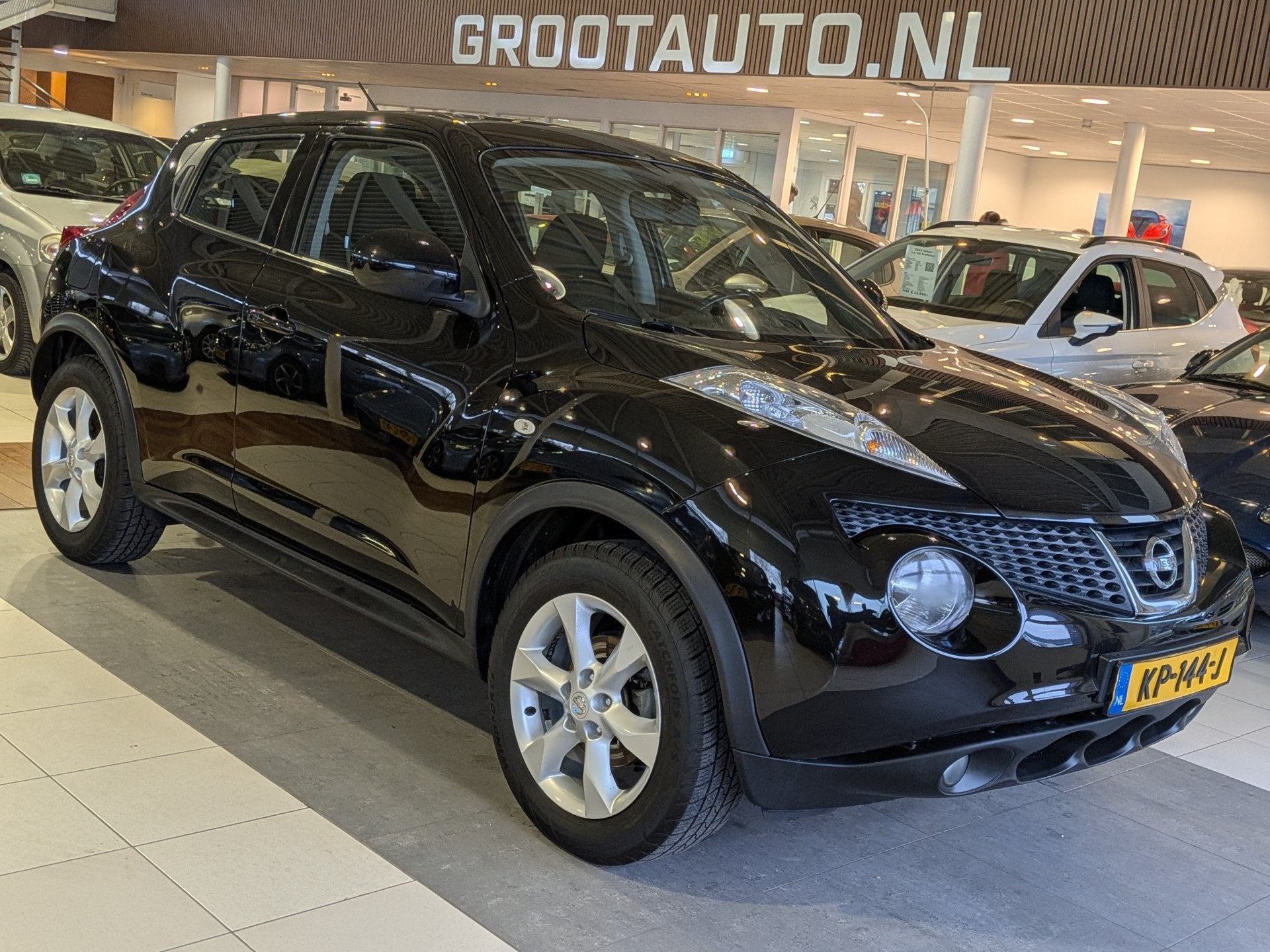 Nissan Juke 1.6 Acenta Airco, Cruise Control, Trekhaak, Stuu, Euro 5, Stof, Zwart, 4 cilinders