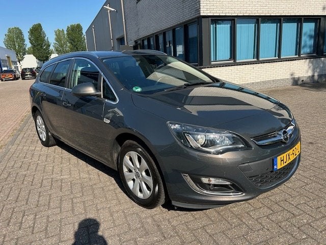 Opel Astra Sports Tourer 1.4 Turbo Sport + NAVI CRUISE CLIMA, Stof, Gebruikt, Euro 6, 4 cilinders