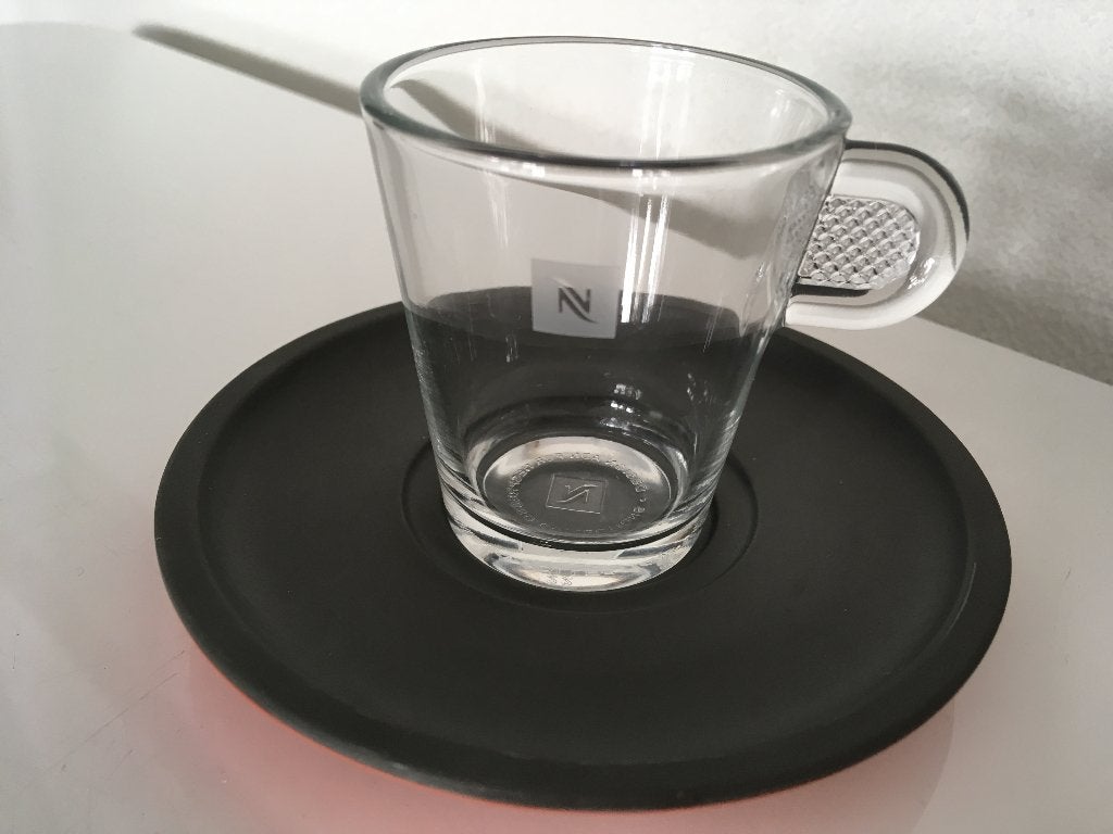 nespresso kop en schotel, Huis en Inrichting, Keuken | Servies, Nieuw, Ophalen of Verzenden, Glas, Overige stijlen