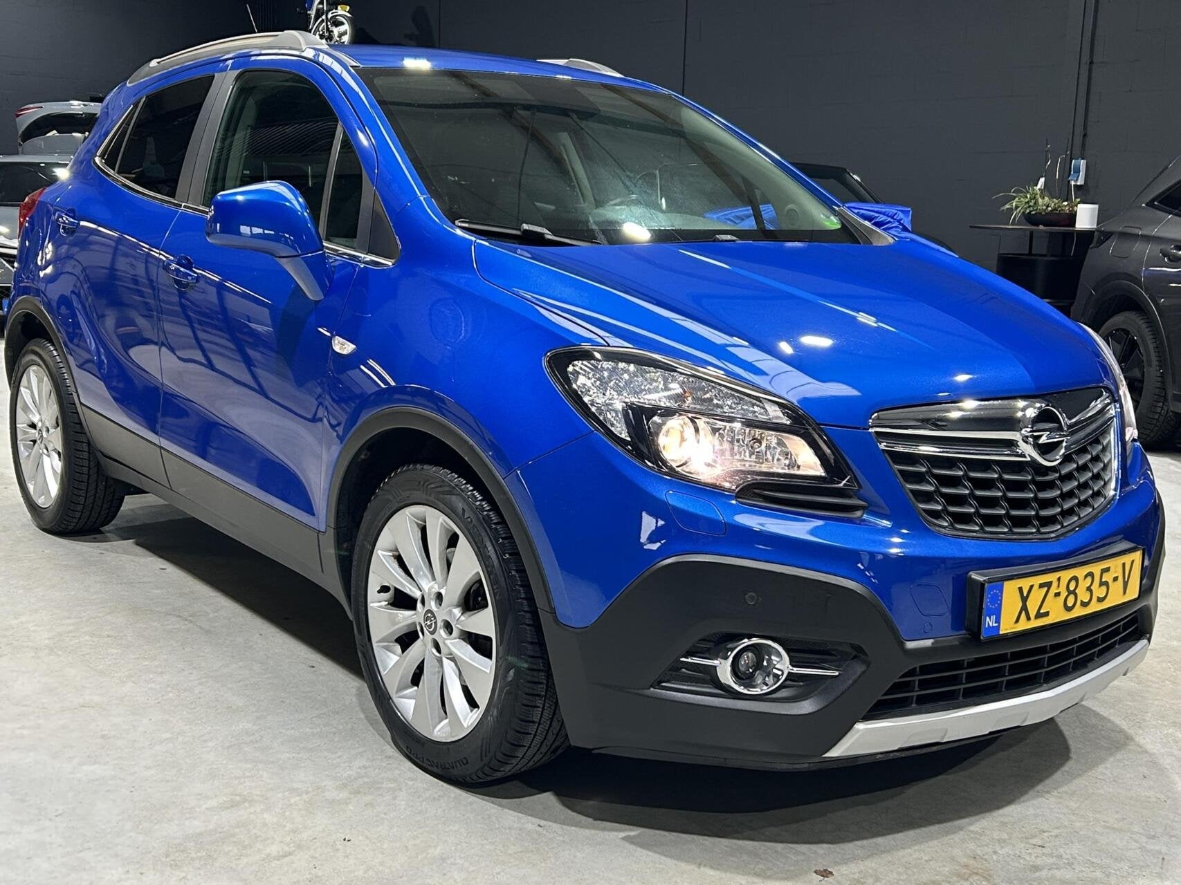 Opel Mokka 1.4 T Cosmo, Gebruikt, 4 cilinders, Blauw, Leder en Stof