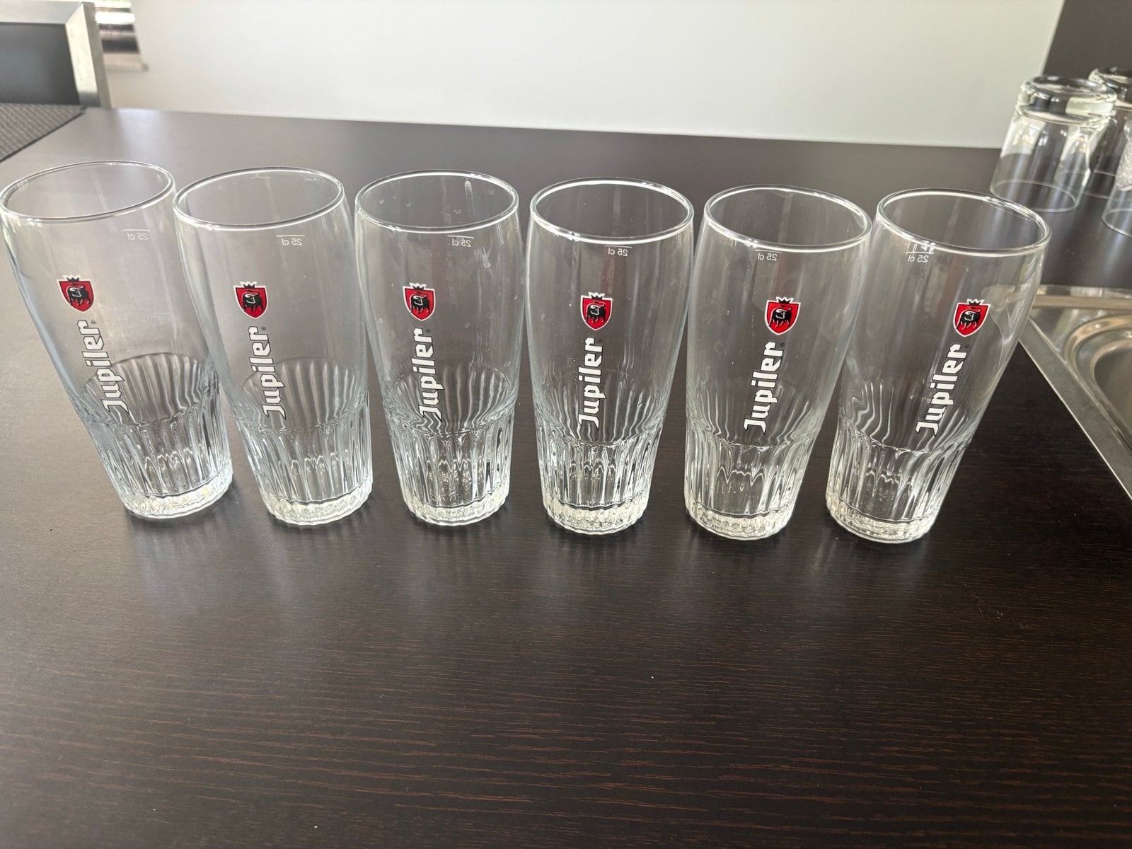 Set van 6 Jupiler bierglazen - Zo goed als nieuw, Ophalen of Verzenden, Zo goed als nieuw, Overige merken, Glas