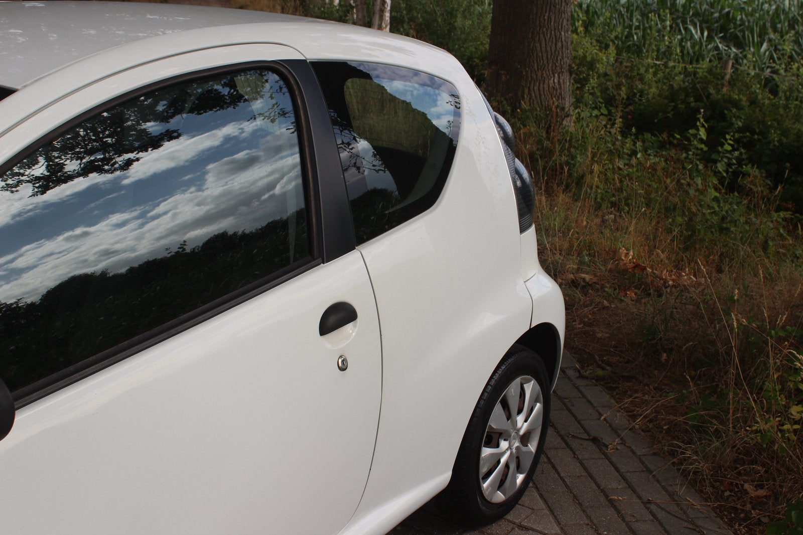 Citroën C1 1.0 3-DRS 2011 Wit NL auto netjes, Auto's, Voorwielaandrijving, Stof, Zwart, 4 stoelen