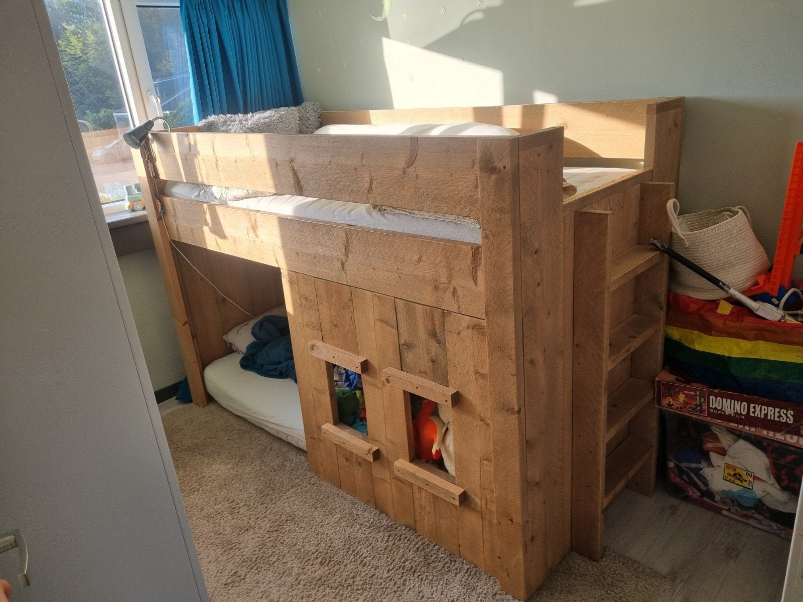 Kinder bed, Ophalen, Hoogslaper
