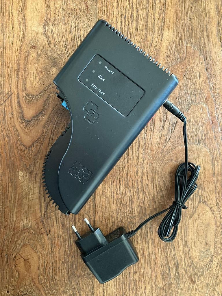 Genexis FiberXport OCG-GN-P2110, Computers en Software, Routers en Modems, Zo goed als nieuw, Ophalen of Verzenden