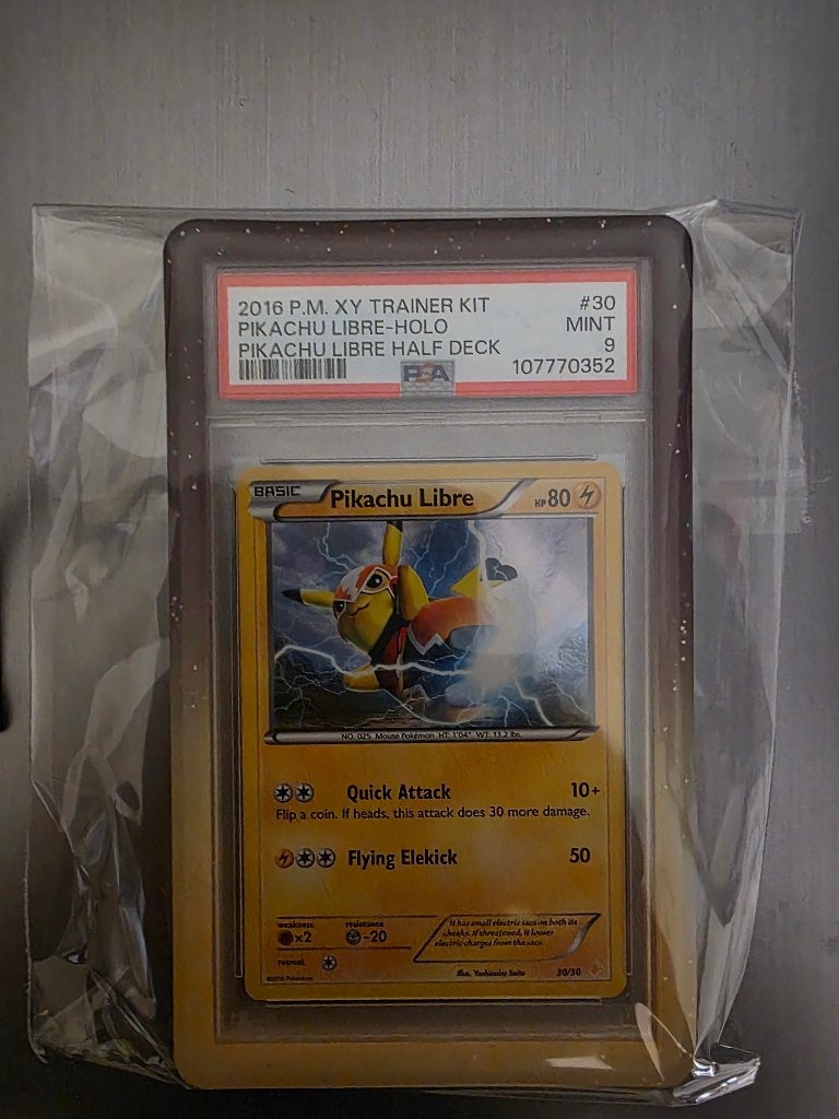 Pokemon Pikachu libre wrestling psa 9, Ophalen of Verzenden, Zo goed als nieuw
