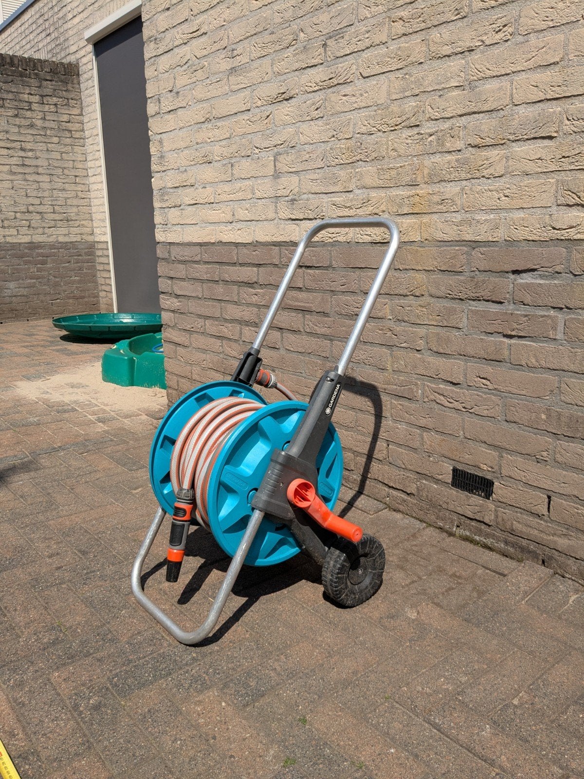 Gardena slangwagen met slang, Ophalen