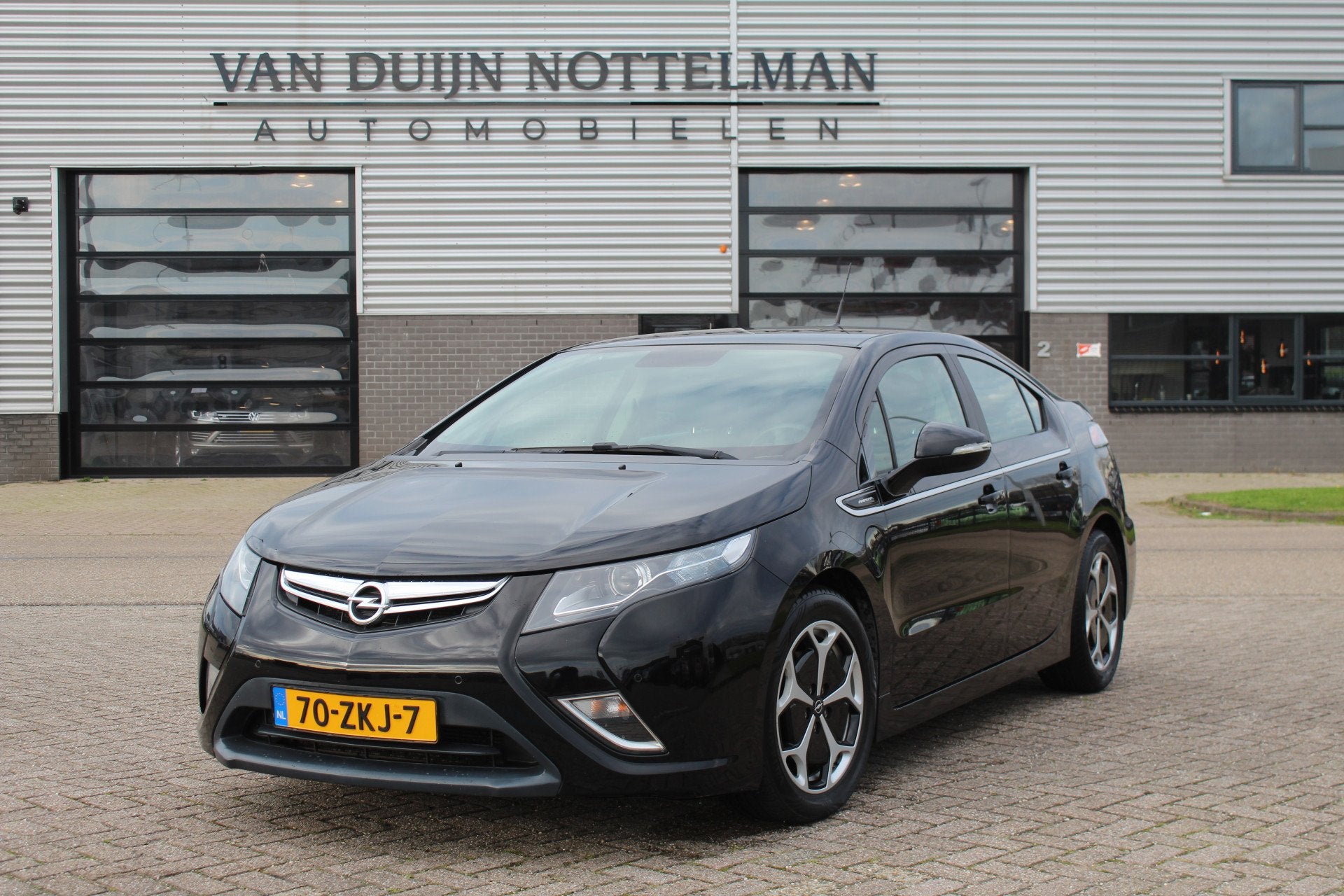 Opel Ampera 1.4 Plug in Hybride / Navigatie / Leer / Bose /, Auto's, Opel, Euro 5, 4 stoelen, Zwart, Bedrijf