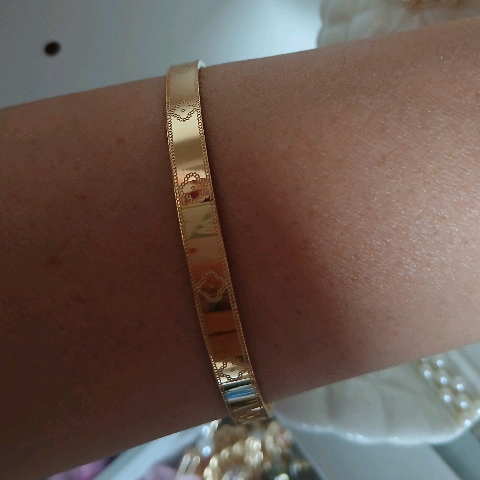 armband met patroon l v, Ophalen of Verzenden, Nieuw, Goud