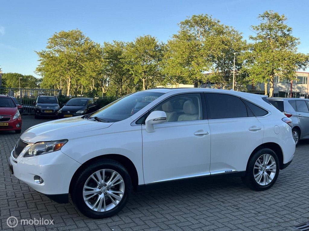 Lexus RX 450h 4WD President LEDER, Panoramadak Dealer onderh, Auto's, Lexus, Automaat, Euro 5, Gebruikt, Beige