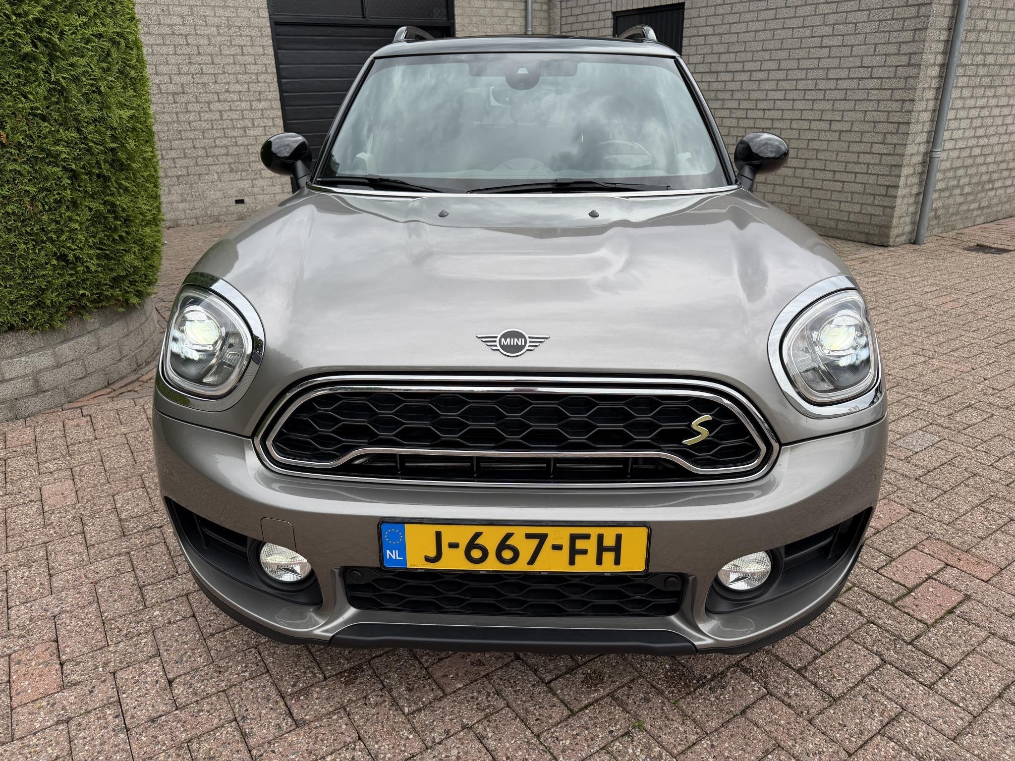 MINI Countryman 1.5 Cooper SE ALL4*Pano*Leer*Carplay*Head-Up, Auto's, Gebruikt, Leder en Stof, Verwarmde buitenspiegels, Plug-in hybride