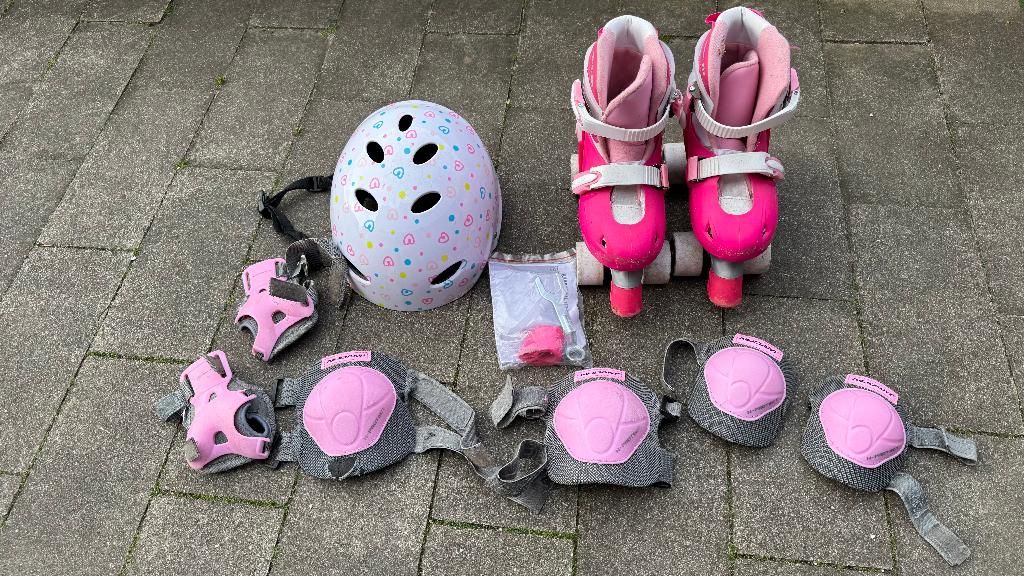 Nijdam roze rolschaatsen set voor kinderen, Kinderen, Ophalen of Verzenden, Verstelbaar, Gebruikt