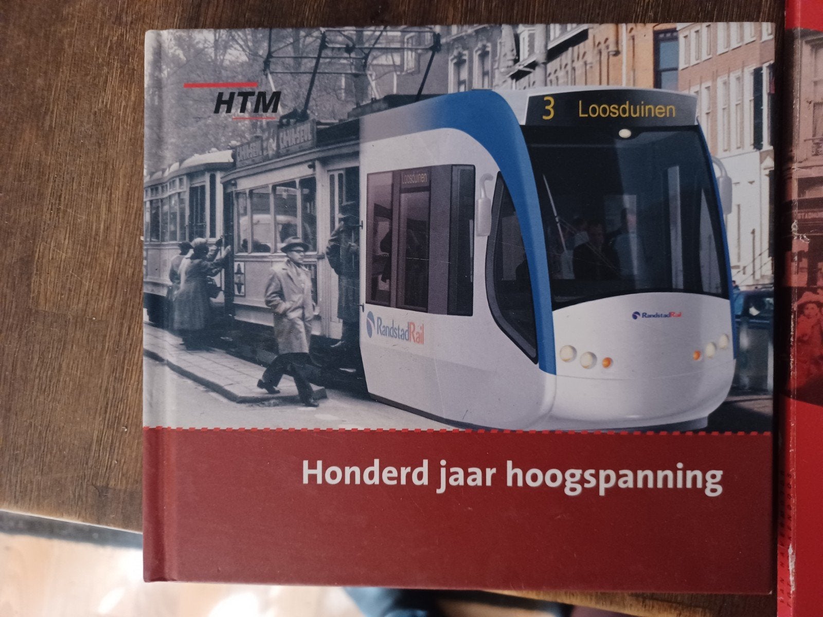 2 boeken openbaarvervoer  en 1 stropdas HTM, Ophalen, Nieuw