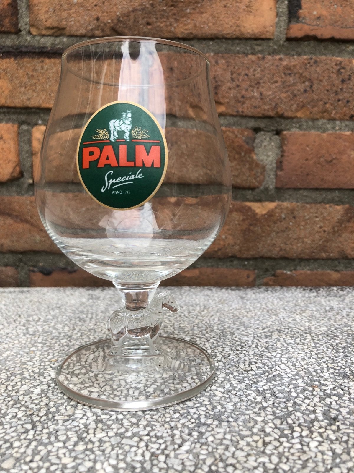 Palm Speciaal bierglas met paardje in de voet, Ophalen of Verzenden, Zo goed als nieuw, Overige merken, Glas