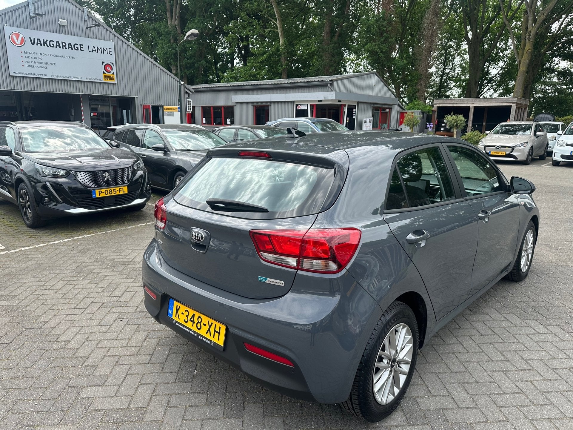 Kia Rio 1.0 T-GDi MHEV DynamicLine , navigatie , pdc met cam, Auto's, Voorwielaandrijving, Dealer onderhouden, 450 kg, Gebruikt