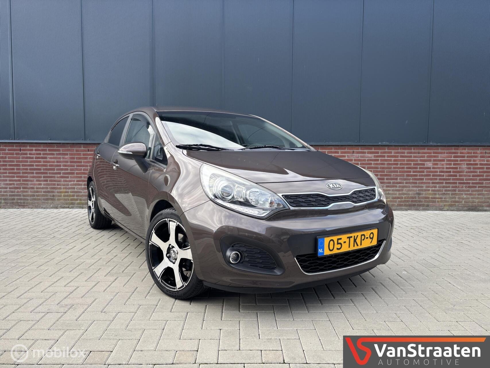 Kia Rio 1.2 CVVT Super Pack | Keyless | Nw motor + koppeling, Auto's, Euro 5, 4 cilinders, Bruin, Origineel Nederlands