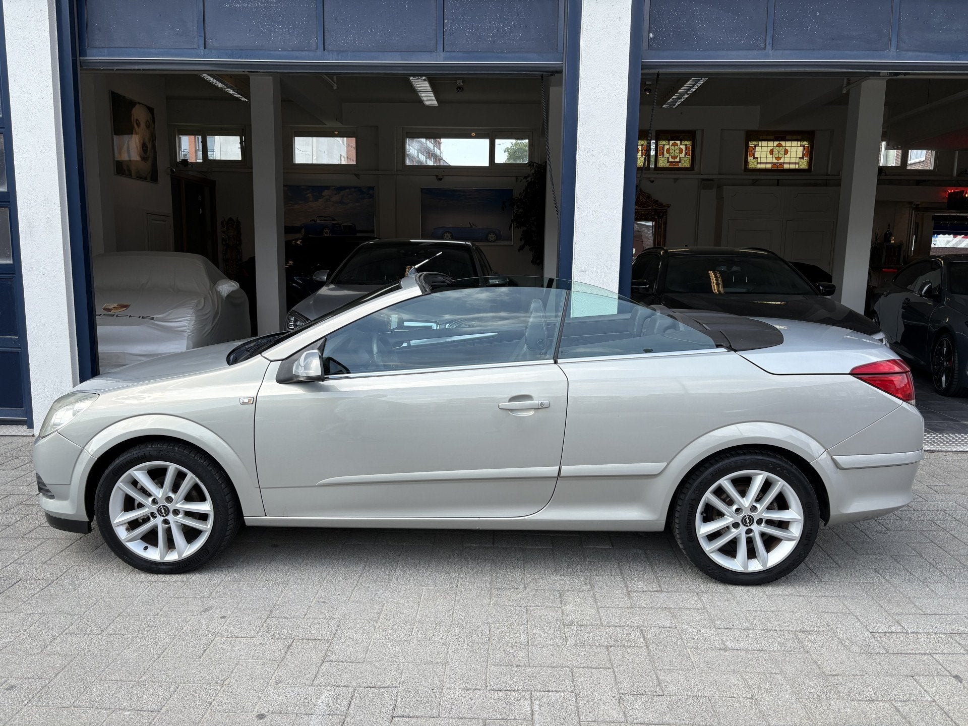 Opel Astra TwinTop 1.8 Cosmo NL AUTO AIRCO/CRUISE/LEDER, Auto's, Opel, Gebruikt, 4 cilinders, Cabriolet, 4 stoelen