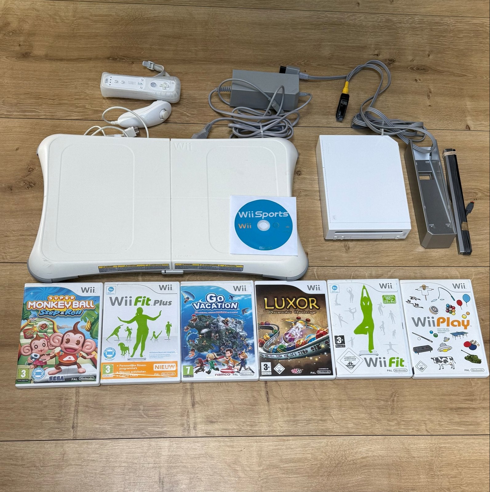 Nintendo Wii bundel met Balance Board en 7 spellen, Ophalen of Verzenden, Gebruikt, Met 1 controller, Met games