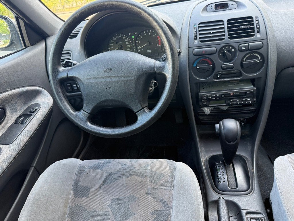 Mitsubishi CARISMA 1.6 GLX AUTOMAAT KOUDE AIRCO RIJDT GOED N, Gebruikt, 4 cilinders, 49 €/maand, Origineel Nederlands