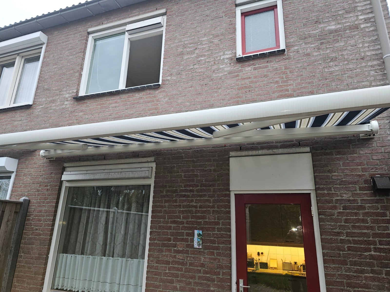Luxaflex knikarmscherm met Somfy motor - 4,5m breed, Ophalen
