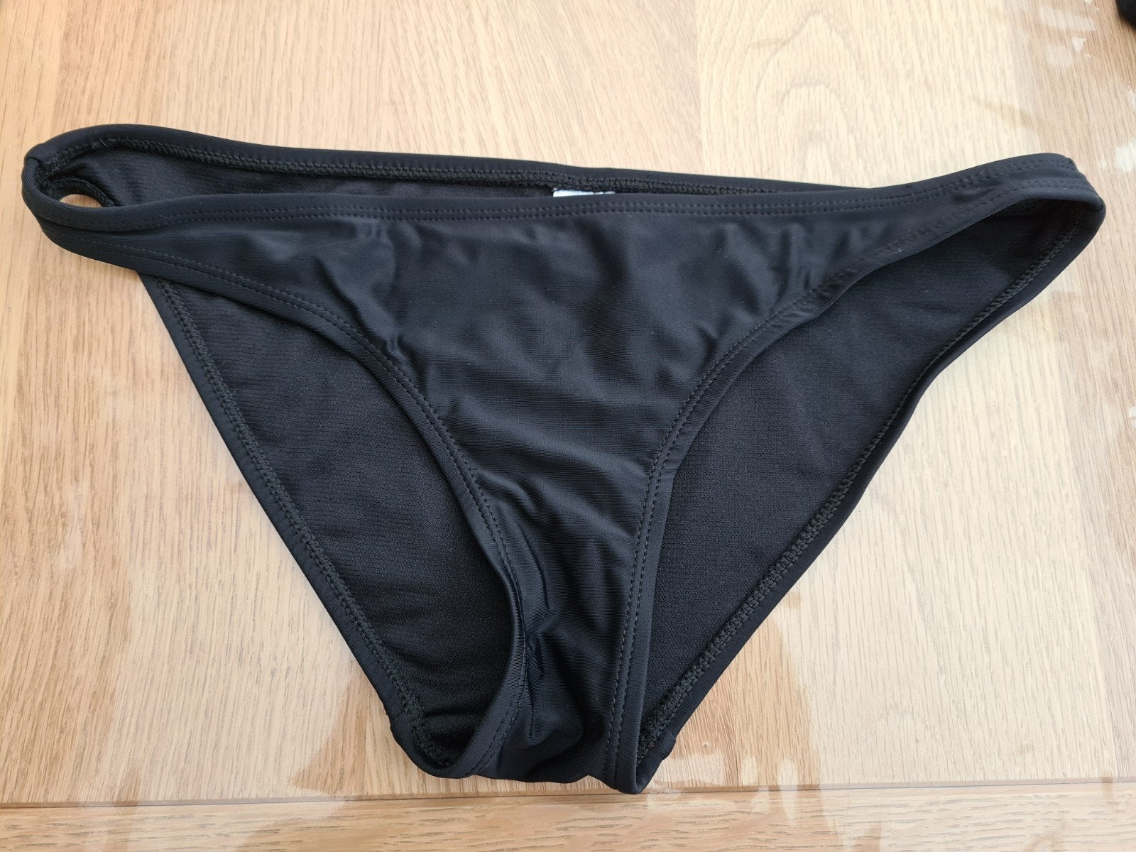 NIEUW zwarte bikinislip Primark mt 36, Ophalen, Nieuw, Zwart, Bikini