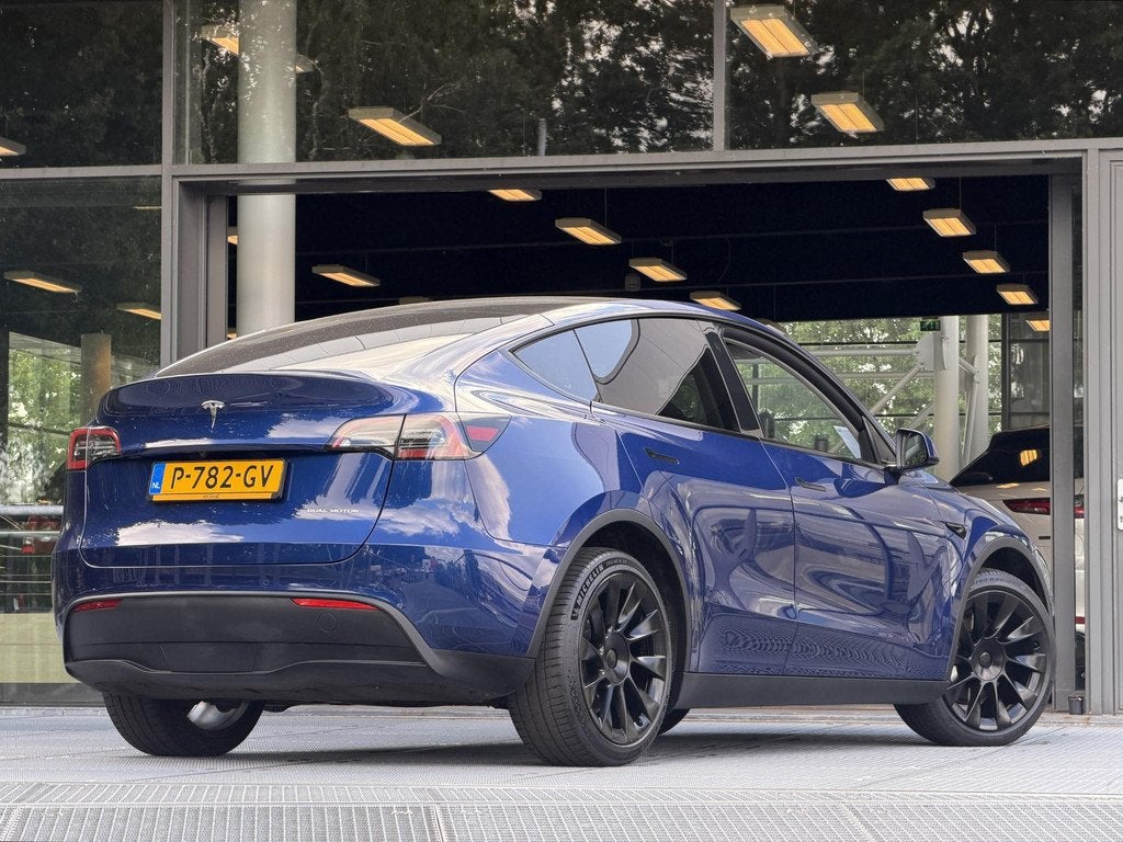 Tesla Model Y Long Range AWD 75 kWh 351PK | SOH 89.9% | Pano, Auto's, Tesla, Stof, Gebruikt, 495 min, Blauw