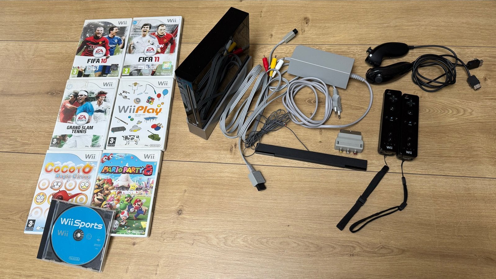 Nintendo Wii Black edition met 2 remotes&nunchucks + 7 games, Ophalen of Verzenden, Gebruikt, Met 2 controllers, Met games