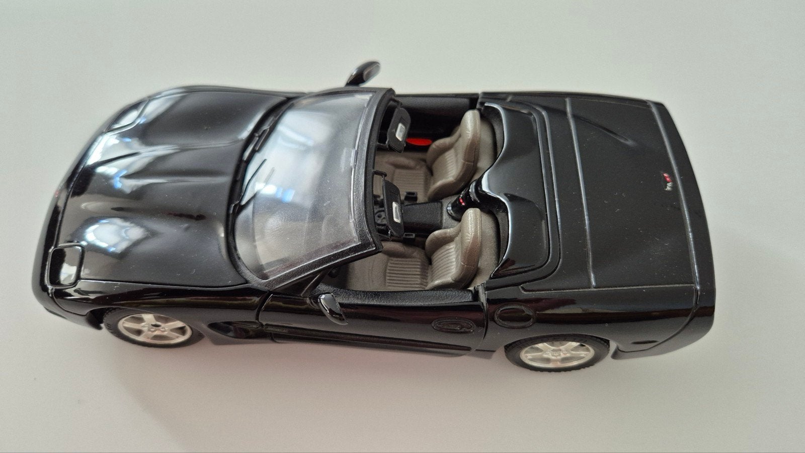 Chevrolet Corvette Schaalmodel 1/24 - Zwart, Ophalen of Verzenden, Zo goed als nieuw, Auto, Bburago