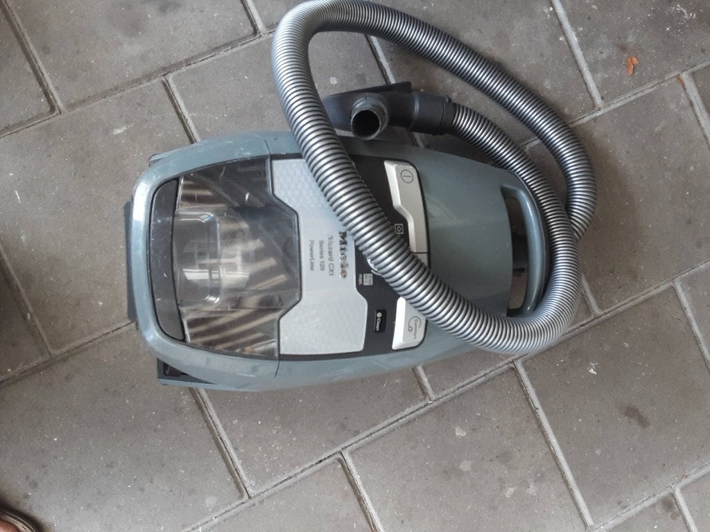 Stofzuiger miele blizzard, Ophalen
