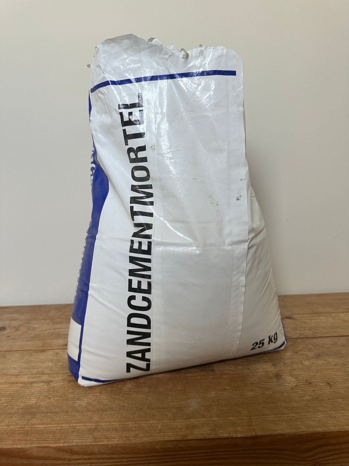 Zandcementmortel geopend maar nog goed, Ophalen, Zo goed als nieuw