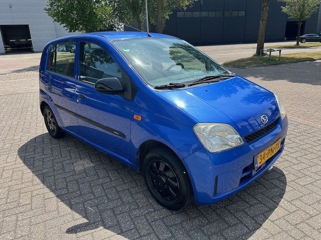 Daihatsu Cuore 1.0-12V Tokyo AUTOMAAT NAP (bj 2004), Auto's, Daihatsu, Automaat, Stof, Airbags, 18 €/maand