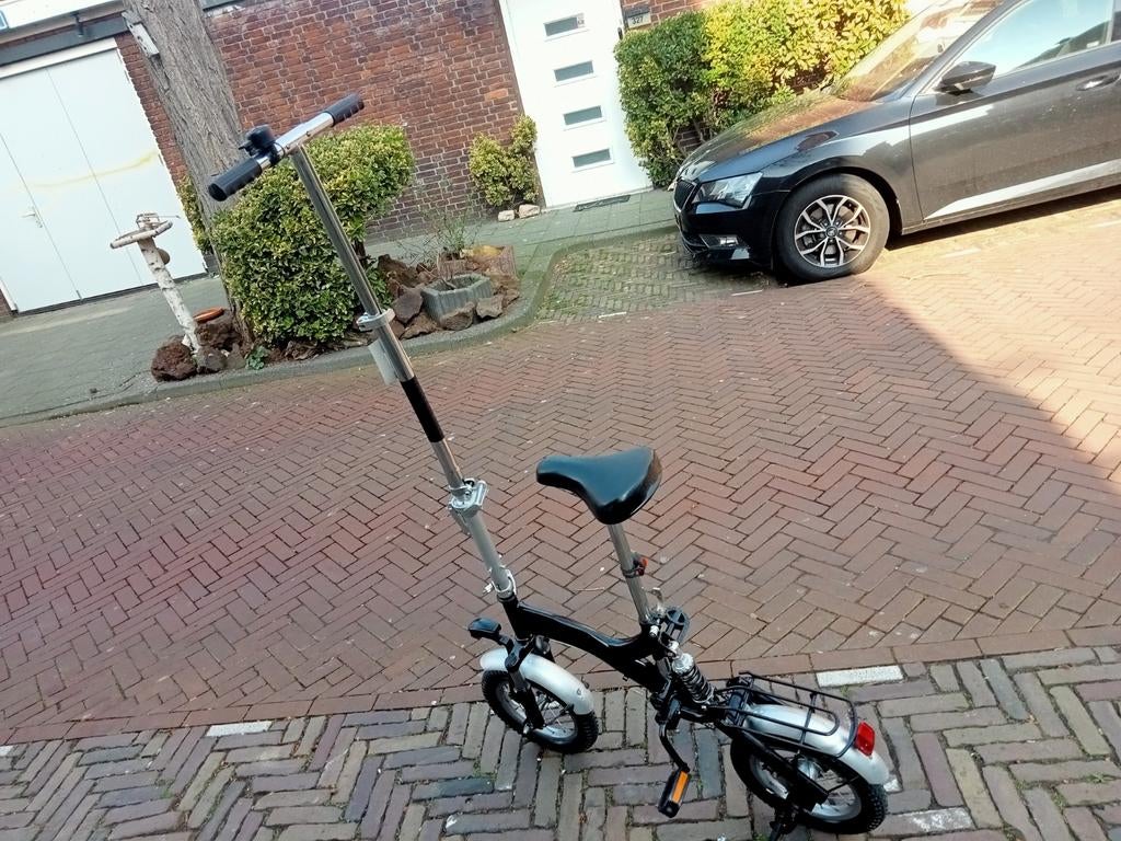 Zeer aparte 12 inch vouwfiets. Full suspension. Uniek !!!!, Ophalen, Zo goed als nieuw, Totaal opvouwbaar, Minder dan 14 inch