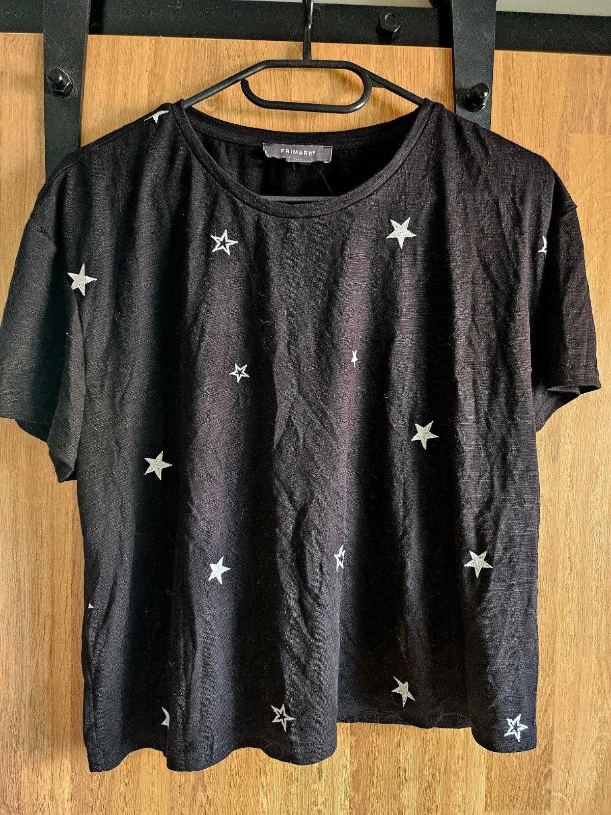 Primark Zwart T-shirt met Sterren - Maat 42/44 (L), Primark, Ophalen of Verzenden