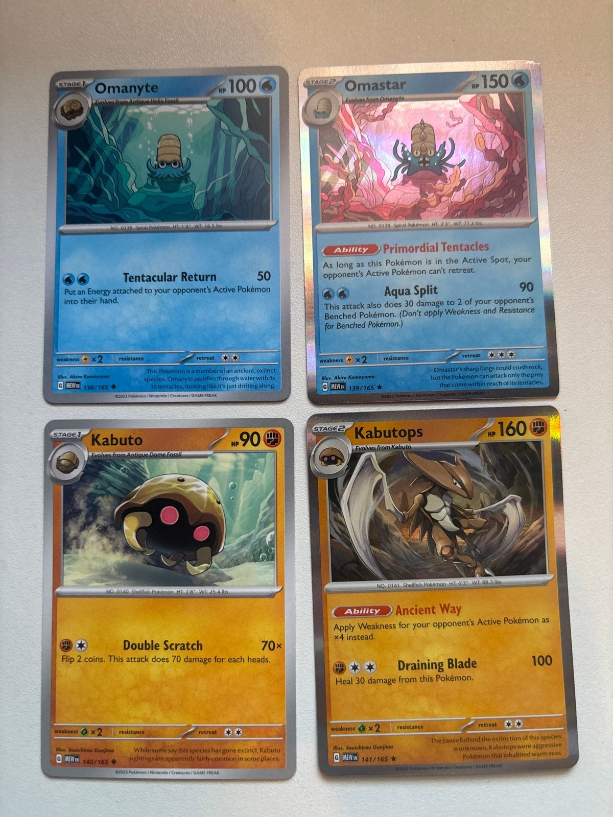 151 serie kaarten: Omanyte, Omastar, Kabuto, Kabutops set, Ophalen of Verzenden, Zo goed als nieuw, Meerdere kaarten