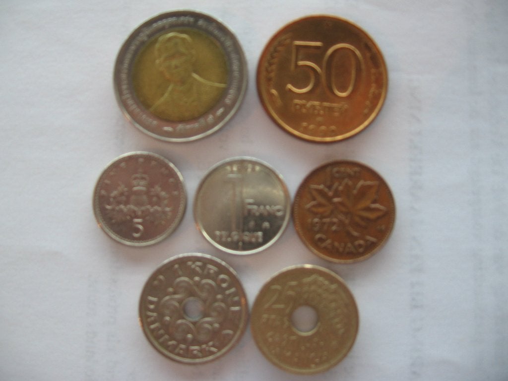 Zeven munten uit verschillende landen, Postzegels en Munten, Ophalen of Verzenden, Overige landen, Losse munt