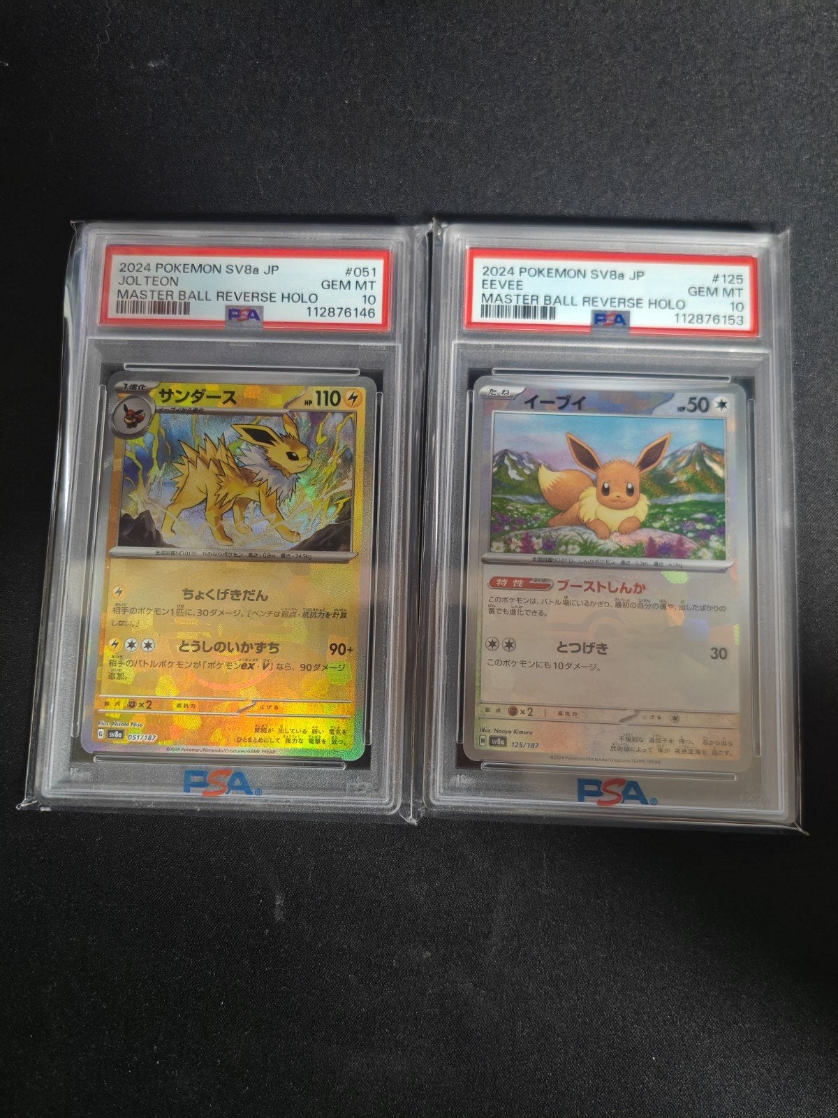 Eevee & Jolteon Master Ball Reverse Holo PSA 10 - SV8a JP, Ophalen of Verzenden, Zo goed als nieuw, Losse kaart, Foil