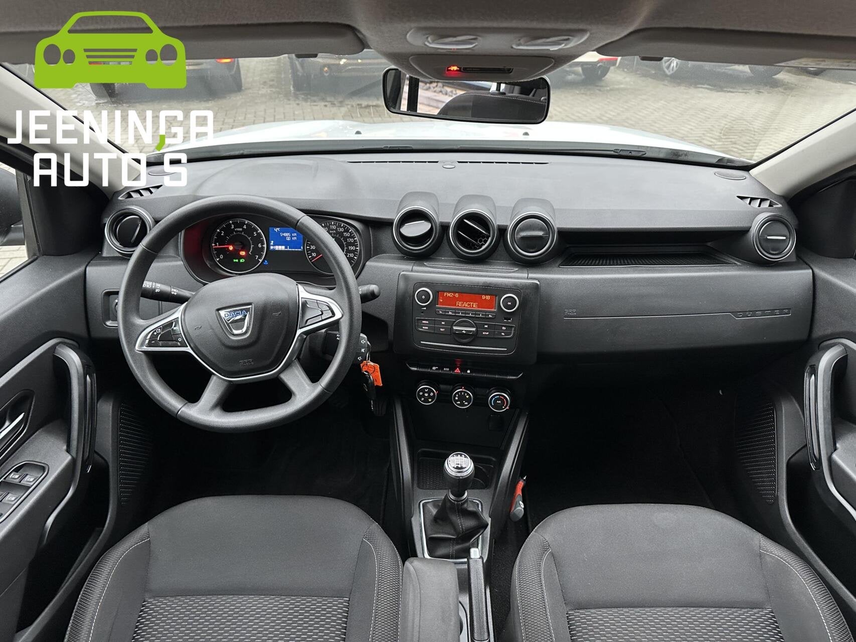 Dacia Duster TCe 100 Comfort|Airco|Cruise, Gebruikt, 4 cilinders, Duster, Wit