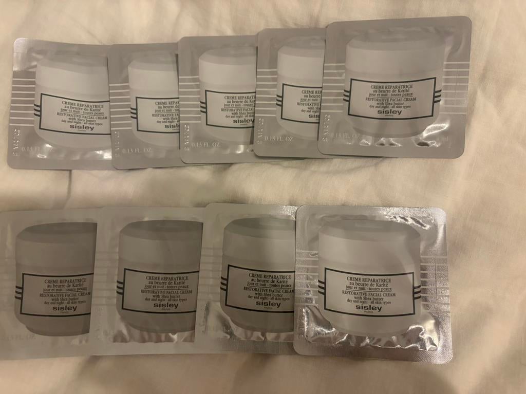 SISLEY CREME REPARATRICE 9x4ML SACHETS 36ML NIEUW!!, Verzenden, Nieuw, Gehele gezicht, Verzorging